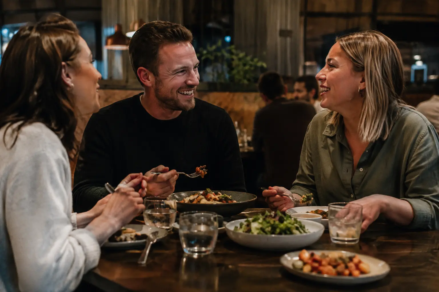 Friends enjoying Friday dinner at a casual restaurant
